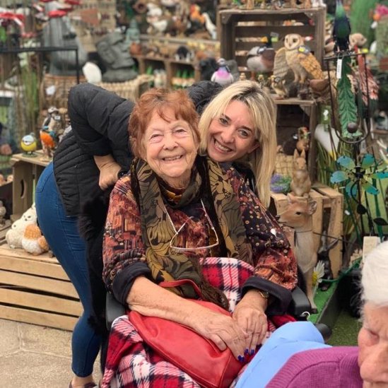 Resident and carer enjoying some time out